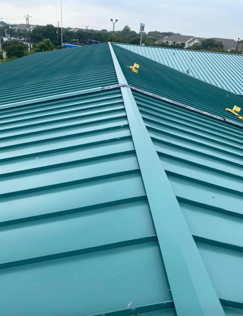 Green commercial metal roof ridge and valley for Metal Roof Repair in Walnut Park